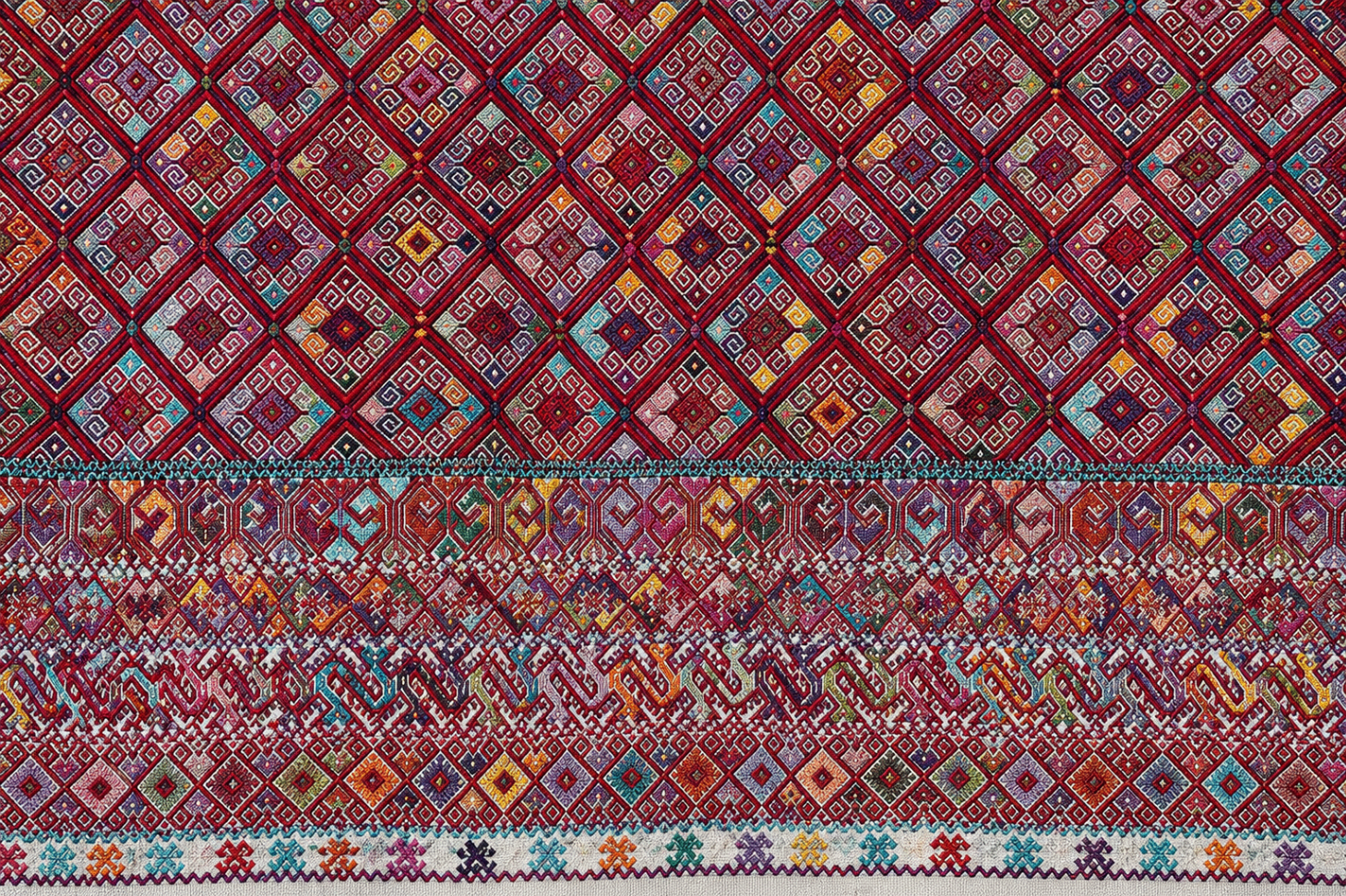 Red diamond brocade characteristic of a Magdalenas Aldama huipil
